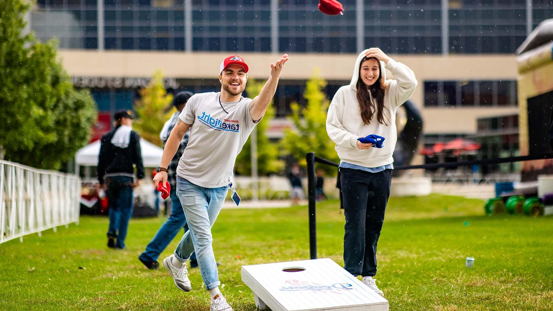 MSU Denver students playing cornhole on Auraria Campus